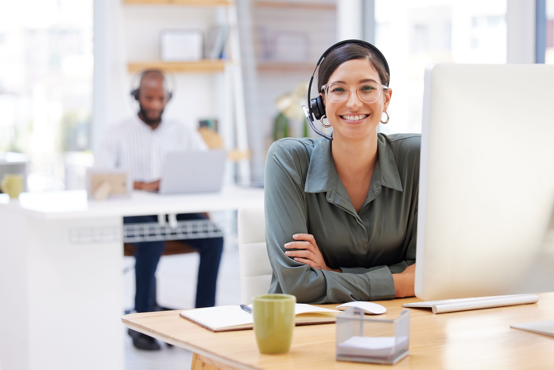 Shot of a young businesswoman working in call center